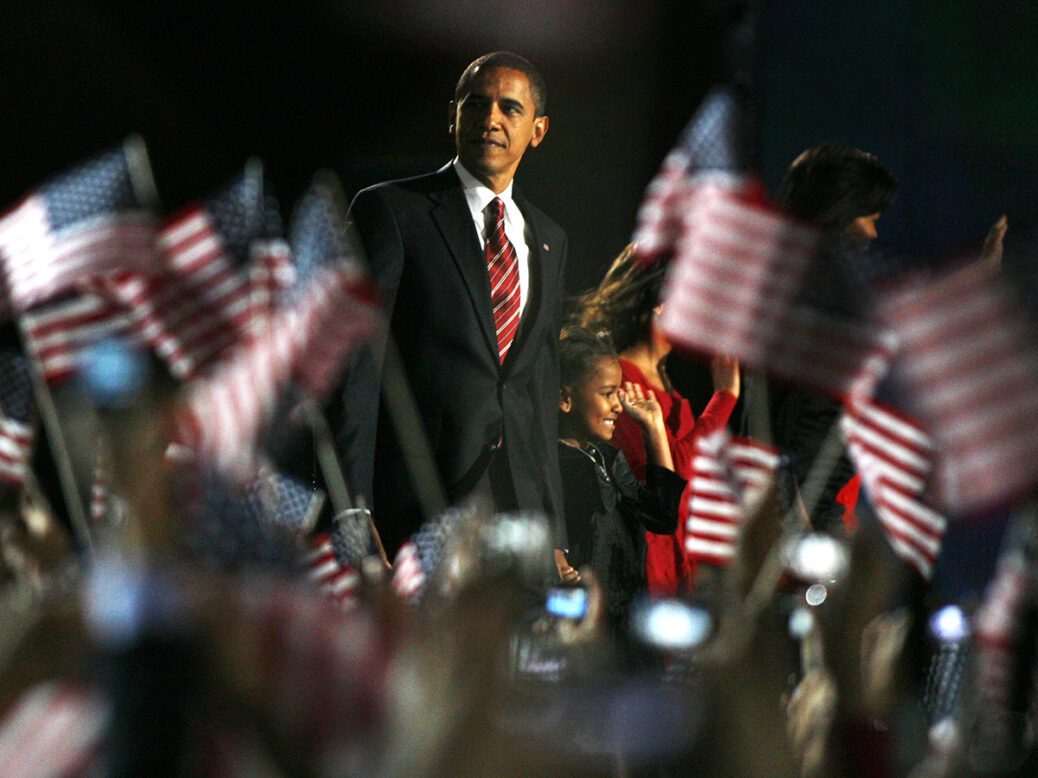 U.S. President-elect Senator Barack Obama stands on stage with family during his election night rally in Chicago